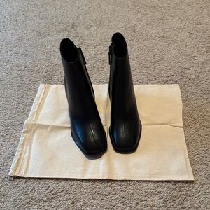 Brand New/Never Worn Tory Burch size 8 Black Ankle Boots with Gold Accent.